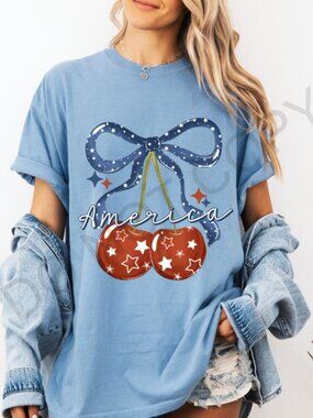 America Cherry Bow Shirt Patriotic Graphic Tee Red White Blue Cute Summer Top
